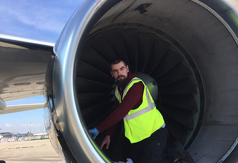 Testia Inspector conducting penetrant testing in an aircraft engine at Orly Airport