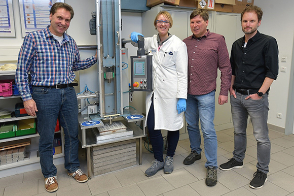 Part of the interdisciplinary team at Testia's impact test machine